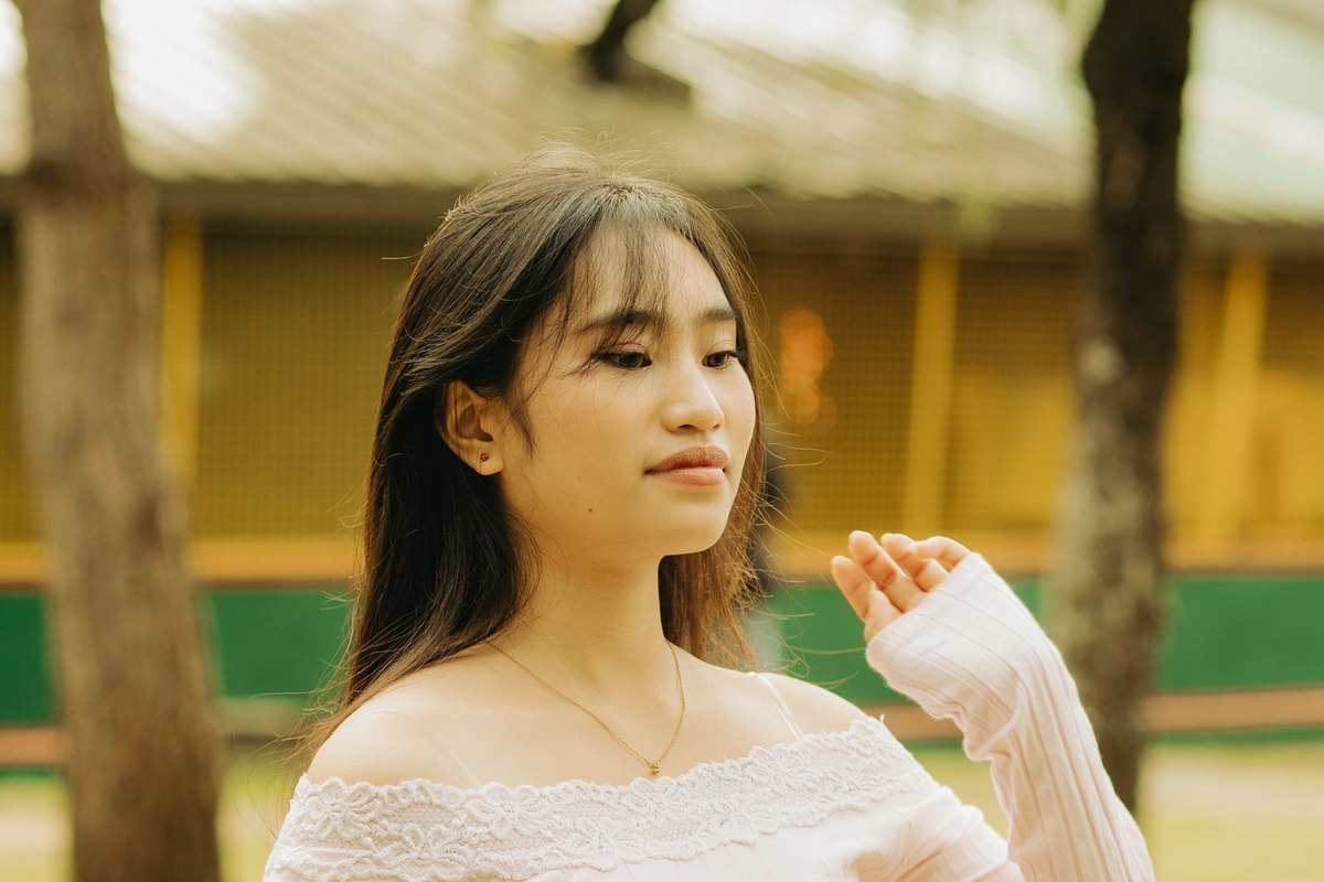 A young woman with long fine straight hair