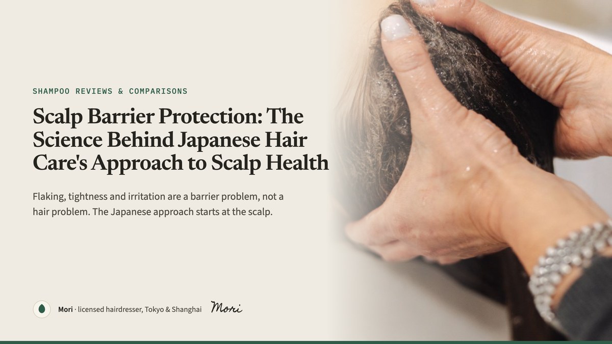 Scalp barrier protection cover: hands massaging a client’s scalp at a salon basin